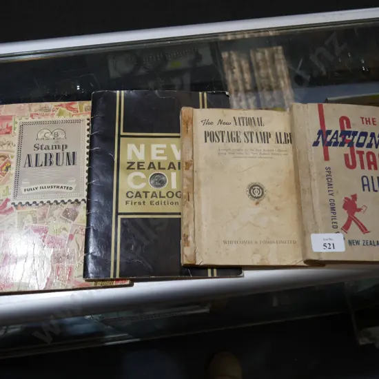 4 stamp albums