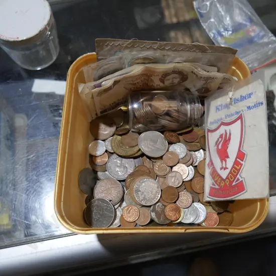 Assorted coins and notes