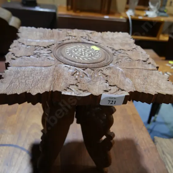Carved wood plant stand