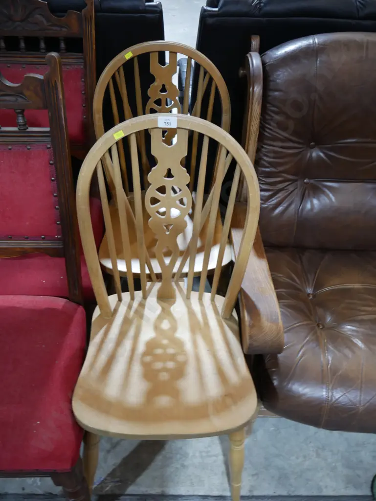 Pair of wheel back wooden chairs Image 1++