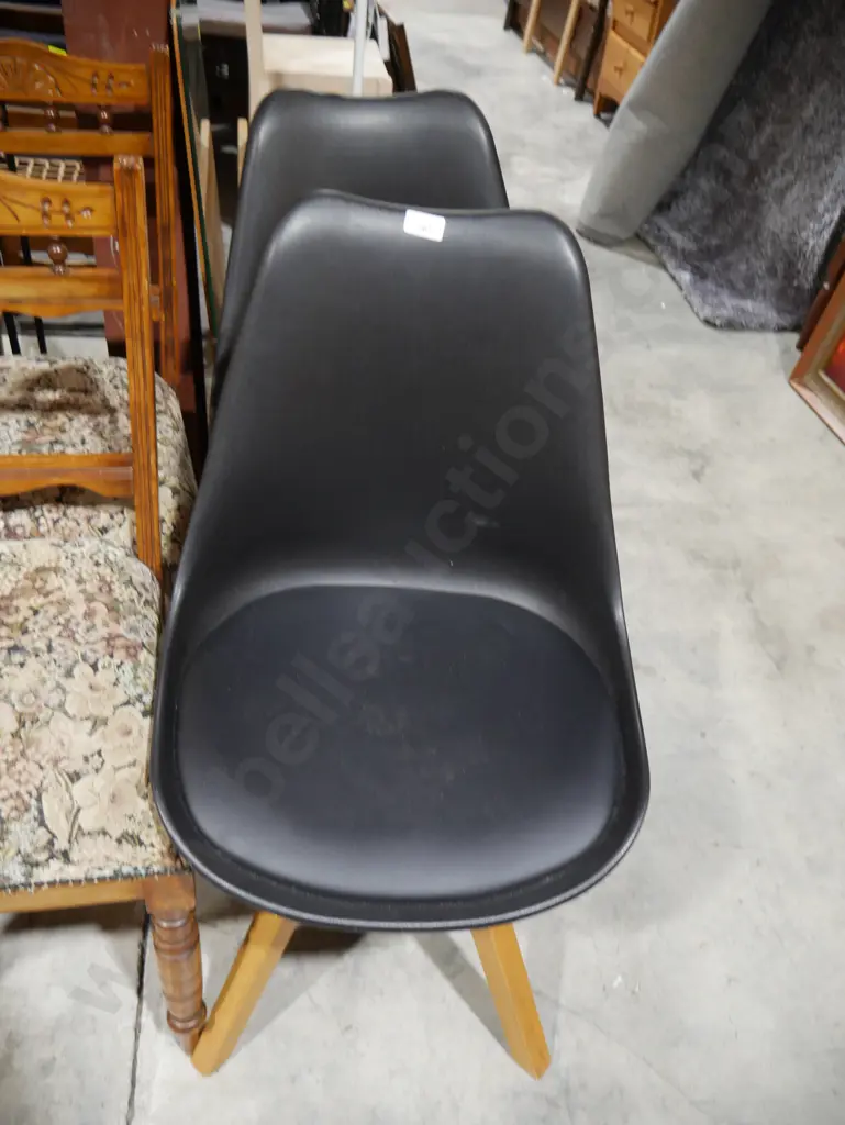 2 modern black chairs Image 1++