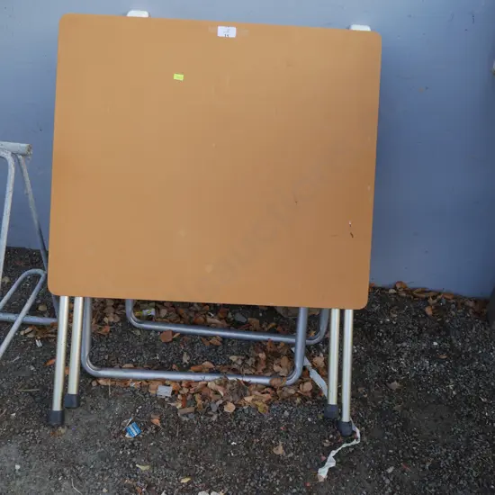 Folding table and two folding chairs