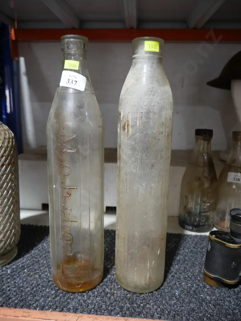 Mobil and Shell oil bottles Image 1++