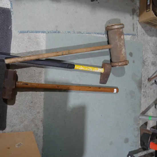 Maul, log splitter and sledgehammer