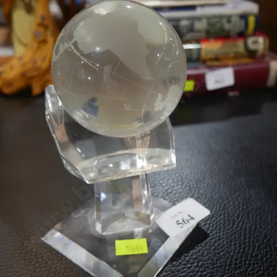 Crystal world in hand globe