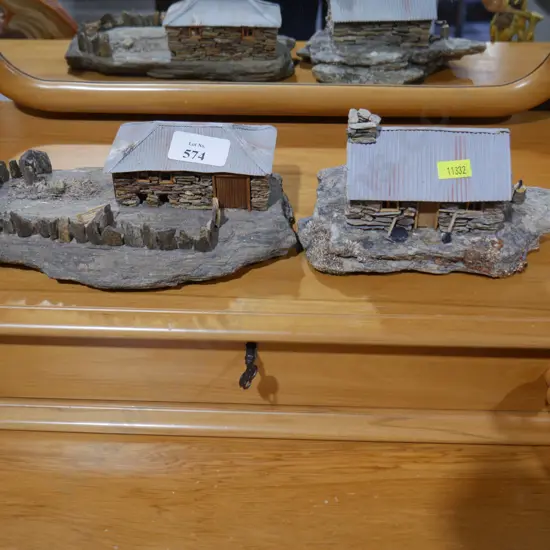 2 stone cottage ornaments