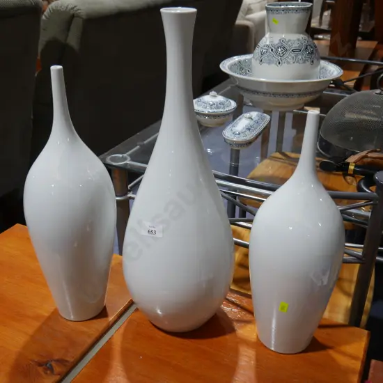 3 white vases