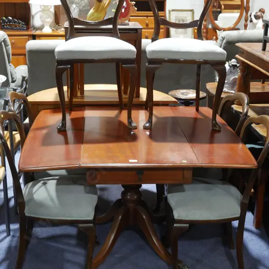 Drop leaf dining table and six chairs