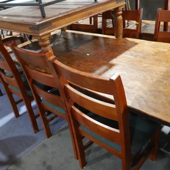 Chip carved dining table and 6 chairs