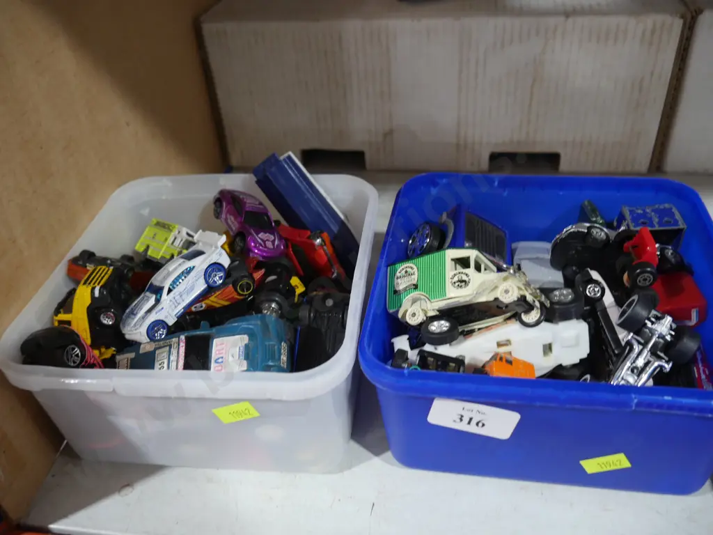 2 tubs of toy cars Image 1++