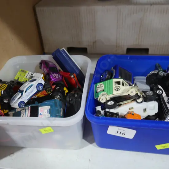 2 tubs of toy cars