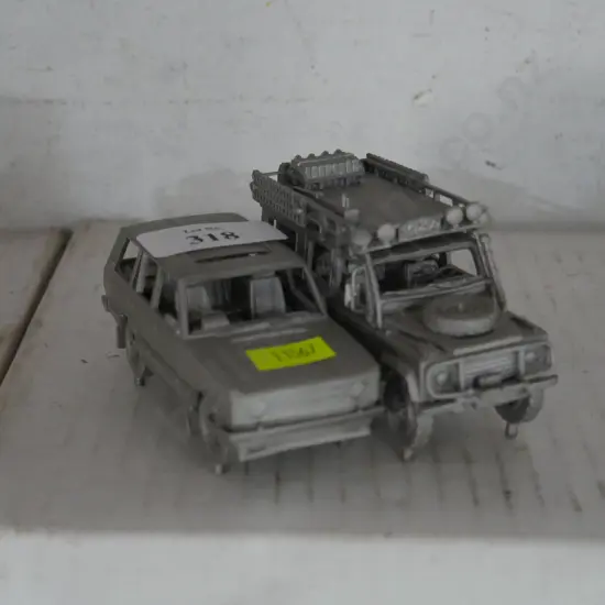 2 pewter model cars