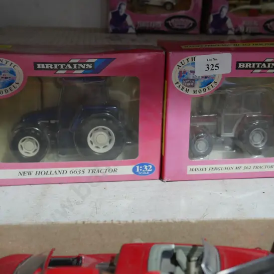 2 Britains model tractors