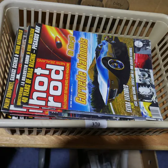 Two boxes of car magazines
