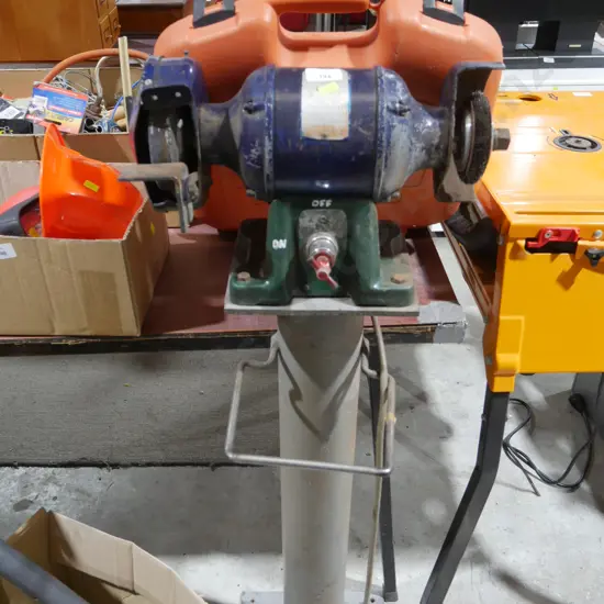Bench grinder on stand