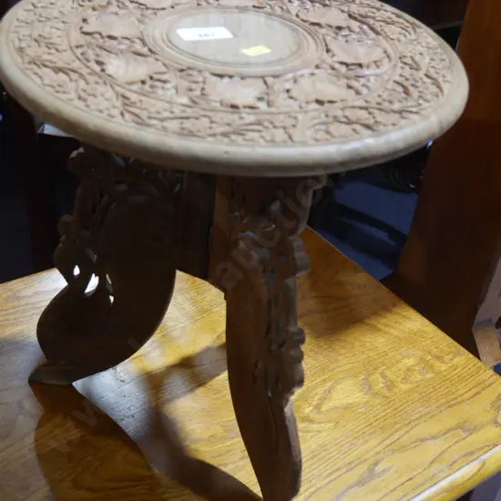 Carved wood side table