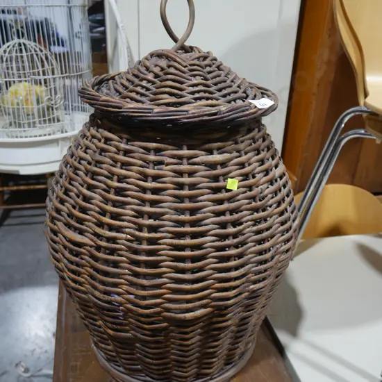 Cane lidded basket
