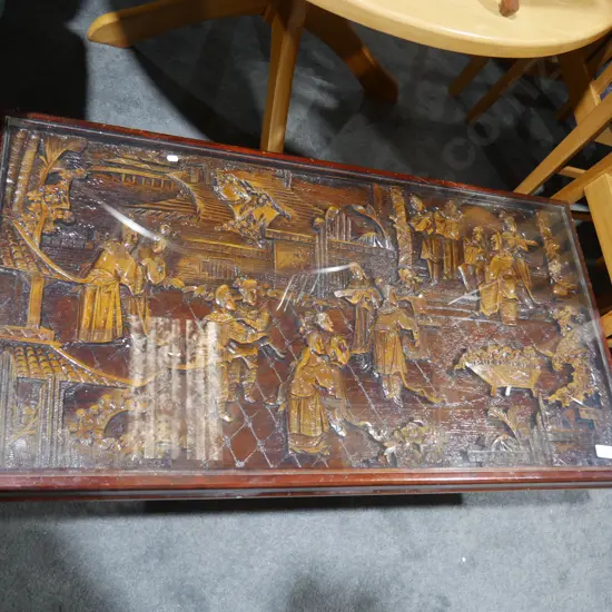 Oriental carved top coffee table