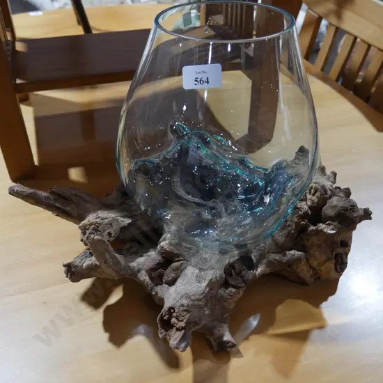 Glass bowl on wood