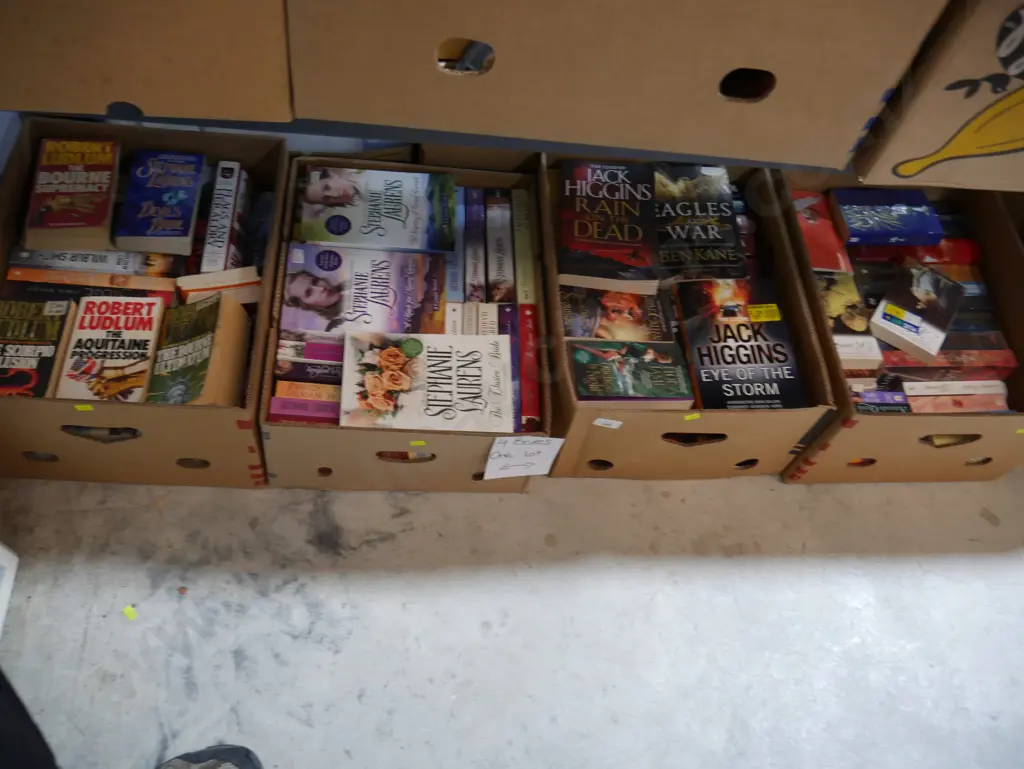 Four boxes of books Image 1++