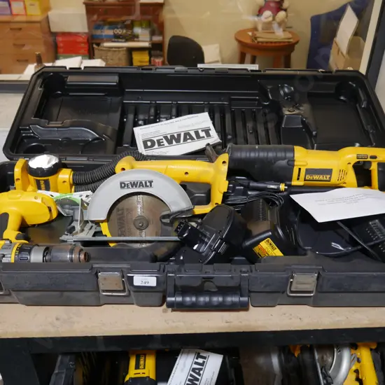 Assorted DEWALT power tools with battery and chargers