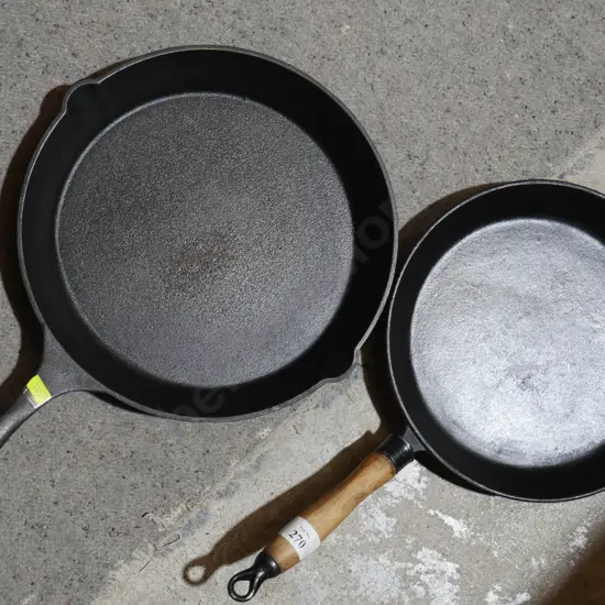 2 cast iron pans
