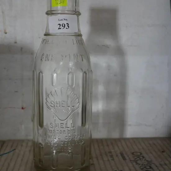 Glass shell oil bottle