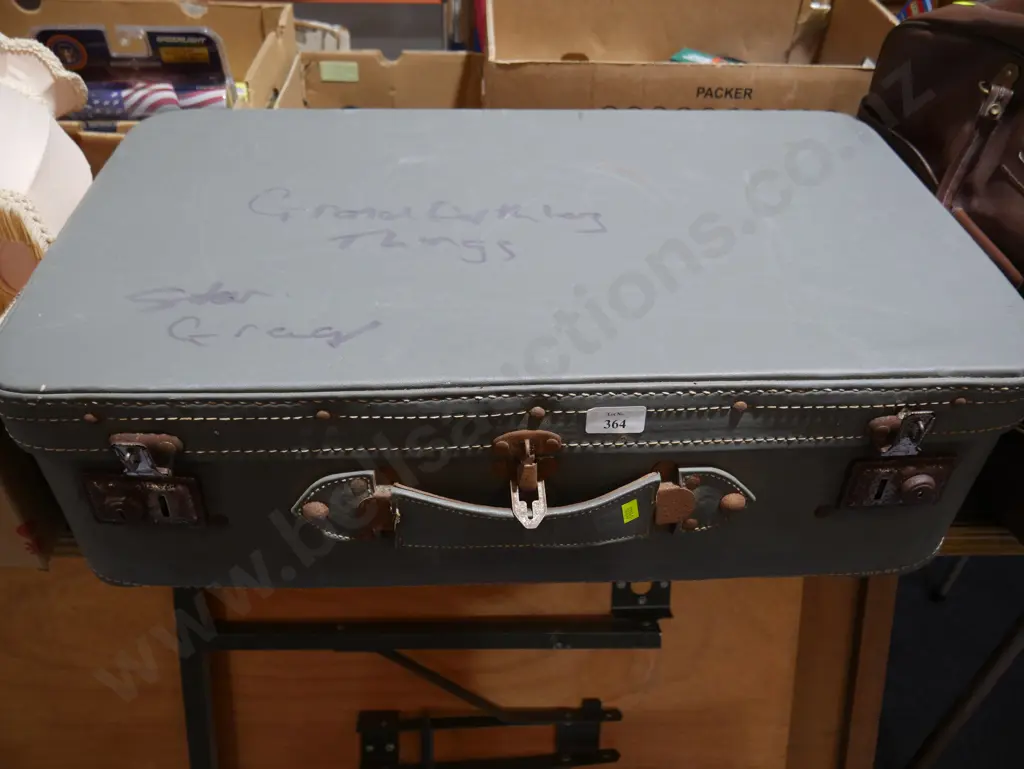 Suitcase and contents Image 1++