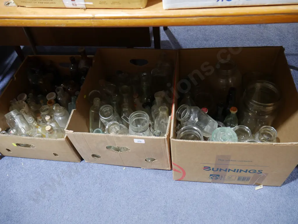 Three boxes of assorted bottles and jars Image 1++