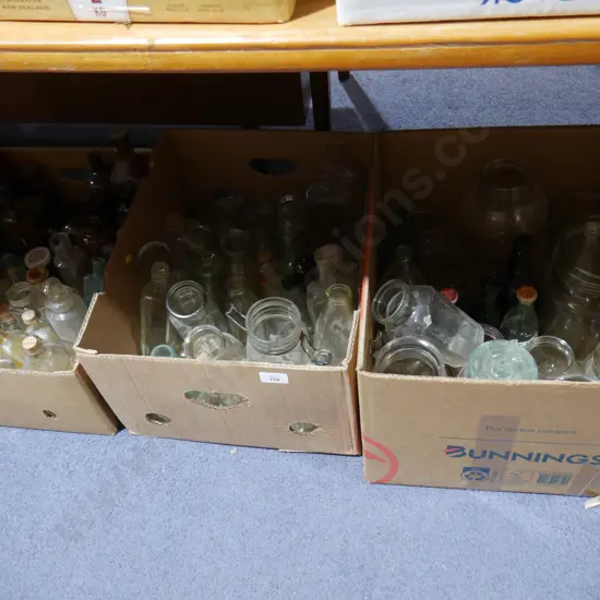 Three boxes of assorted bottles and jars
