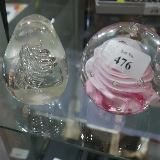 Two glass paper weights