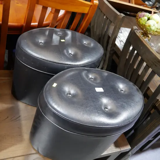 2 black ottomans