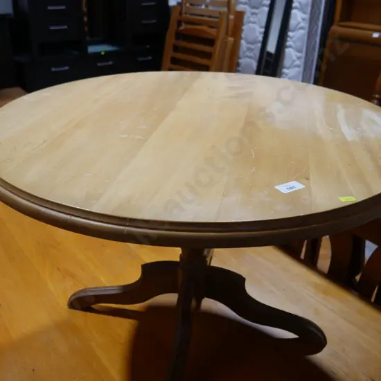 Round pedestal coffee table