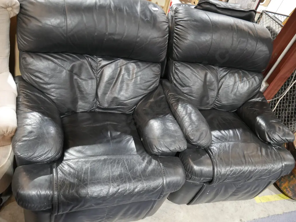 Pair of black leather recliner armchairs Image 1++