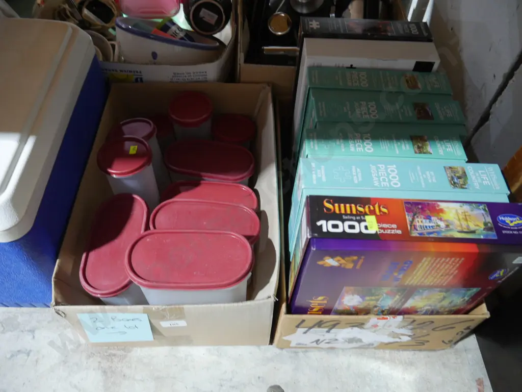 2 boxes of jigsaw puzzles and plastic containers Image 1++