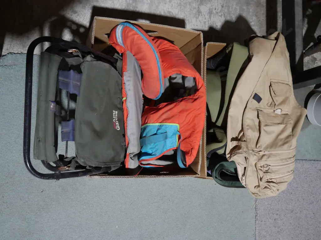 Two boxes of waders, life jacket etc Image 1++