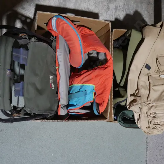 Two boxes of waders, life jacket etc