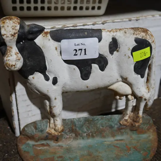 Cast iron cow door stop