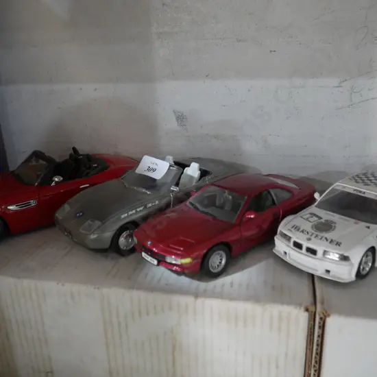 Four model cars