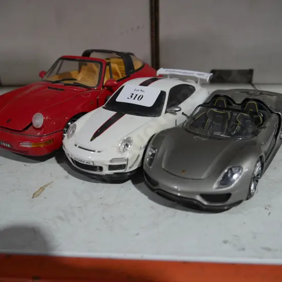 Three model cars