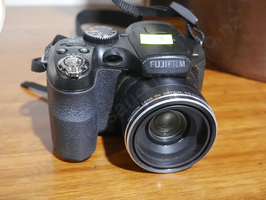 Fujifilm camera and bag Image 1++
