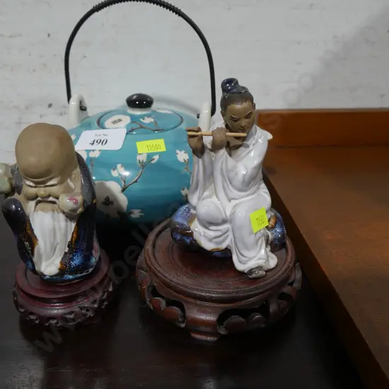 Oriental figurines teapot