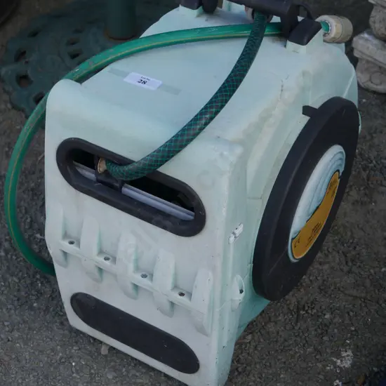 Wall mounted hose and reel