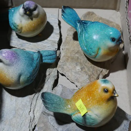 4 bird ornaments