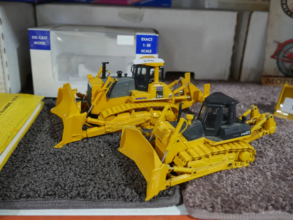 2 die cast model bulldozers Image 1++