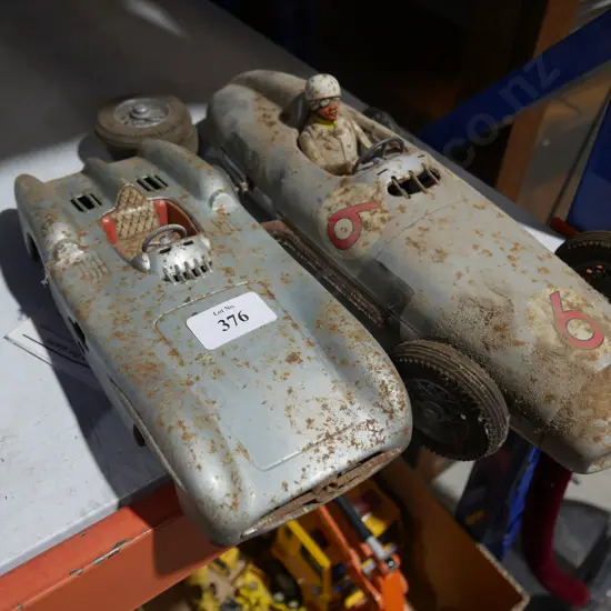2 tin race cars
