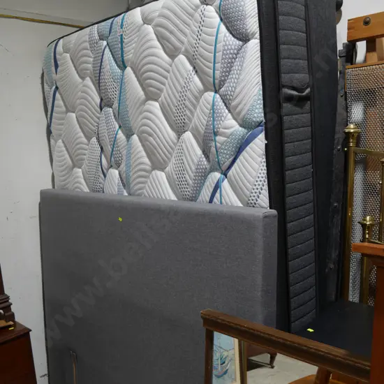 Queen bed and fabric headboard