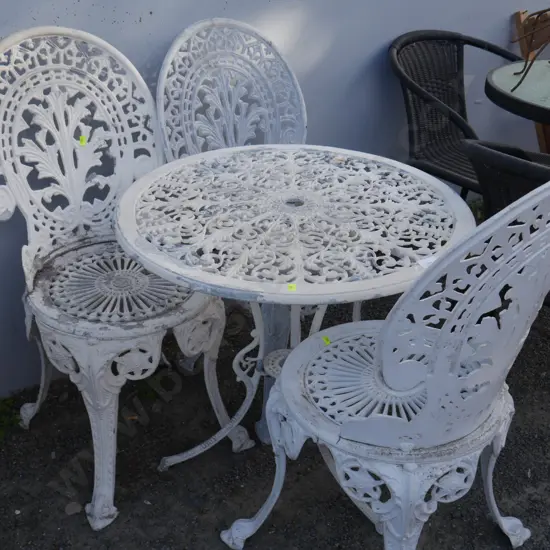 White aluminium table and three chairs