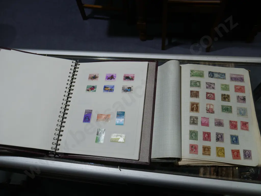 Two stamp albums and stamps Image 1++