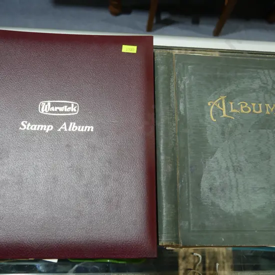 Two stamp albums and stamps
